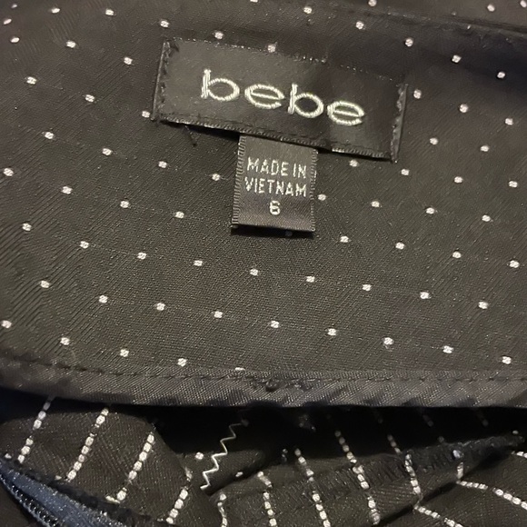 BEBE BLACK & WHITE POLKA DOT SKIRT. - Picture 2 of 5